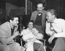 Mario Lanza visiting the set with John Alton (cameraman) and Van Johnson